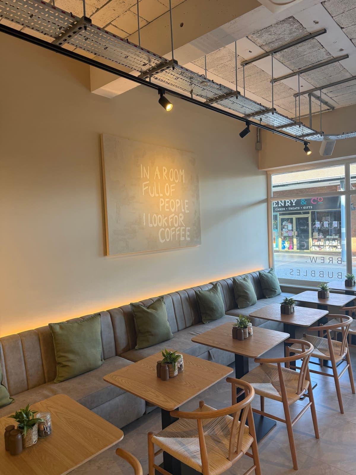 Window seating at TOAST & Co looking out onto Park Farm shopping centre in Allestree, Derby